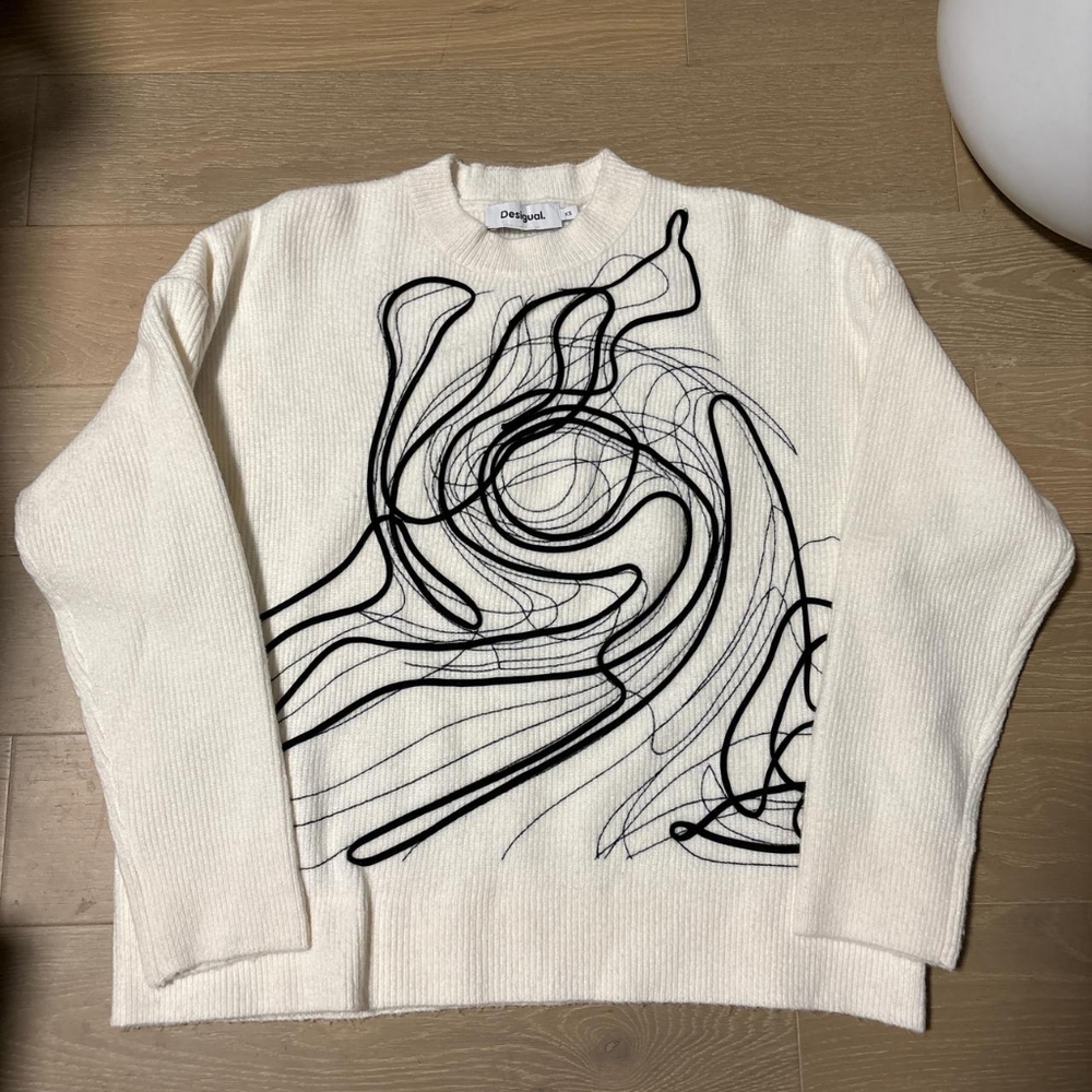 White Sweater with Black Design